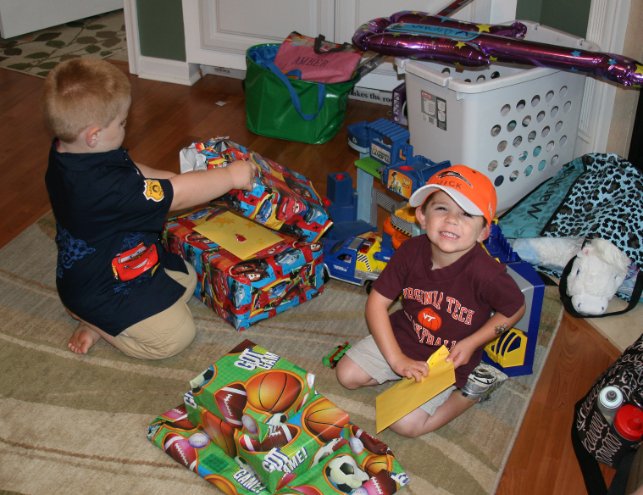 Jacob and Nick open family presents Sunday morning